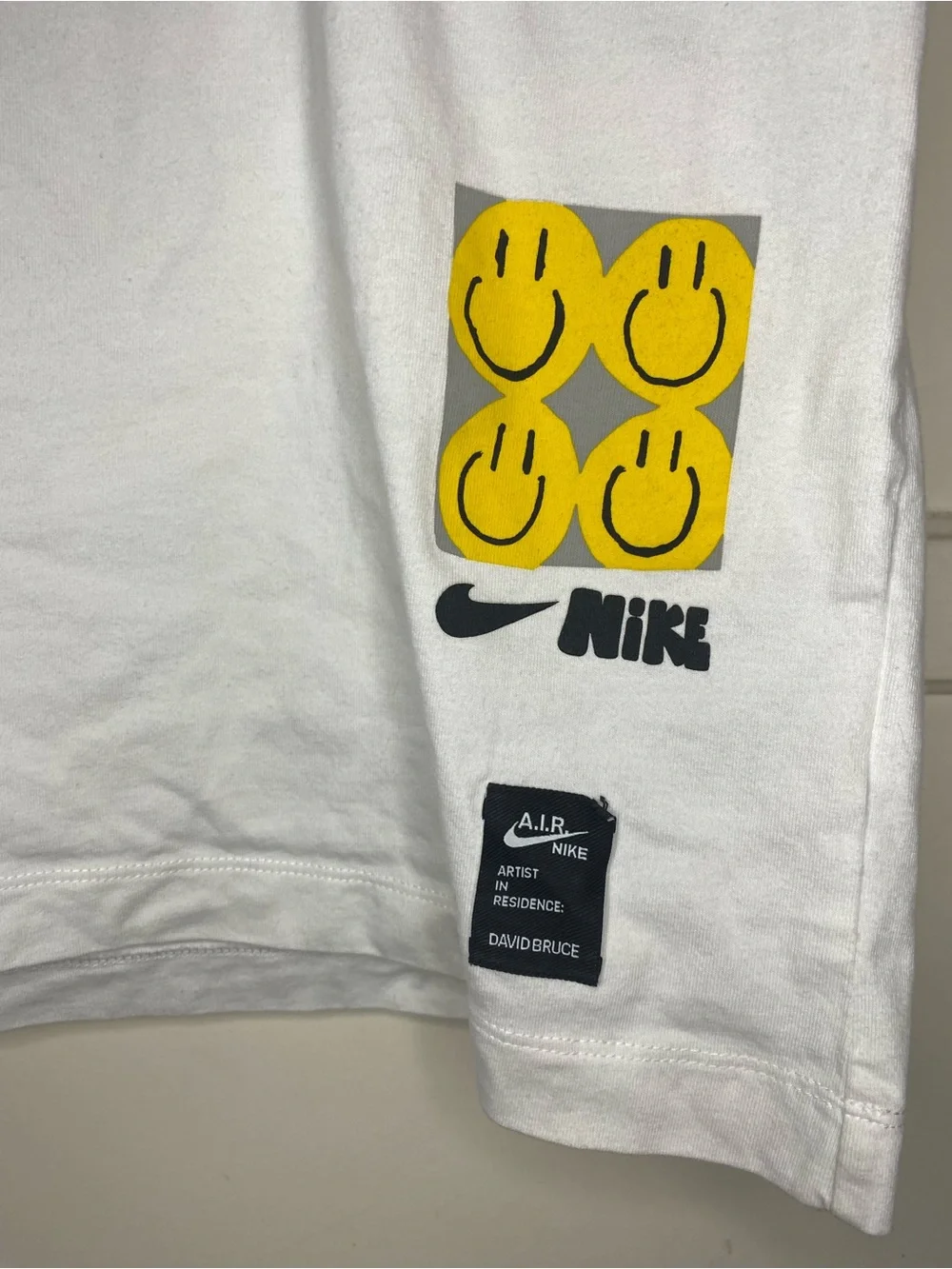 Nike White Graphic Tee with Colorful Print